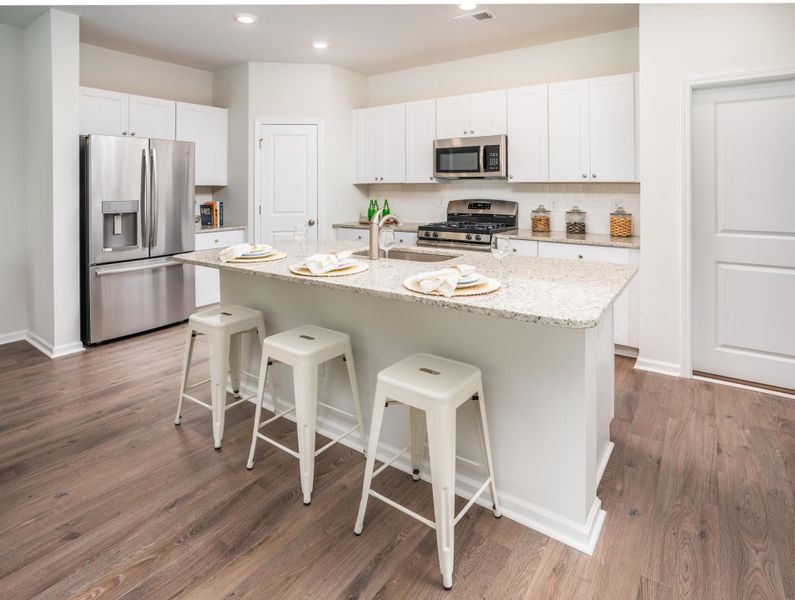 Furnished interior view inside a new home in Lindera Preserve at Cane Bay Plantation: American Dream Series - Ph 15, Summerville (Image 6). Furnished interior view inside a new home in Lindera Preserve at Cane Bay Plantation: American Dream Series - Ph 15, Summerville (Image 6).