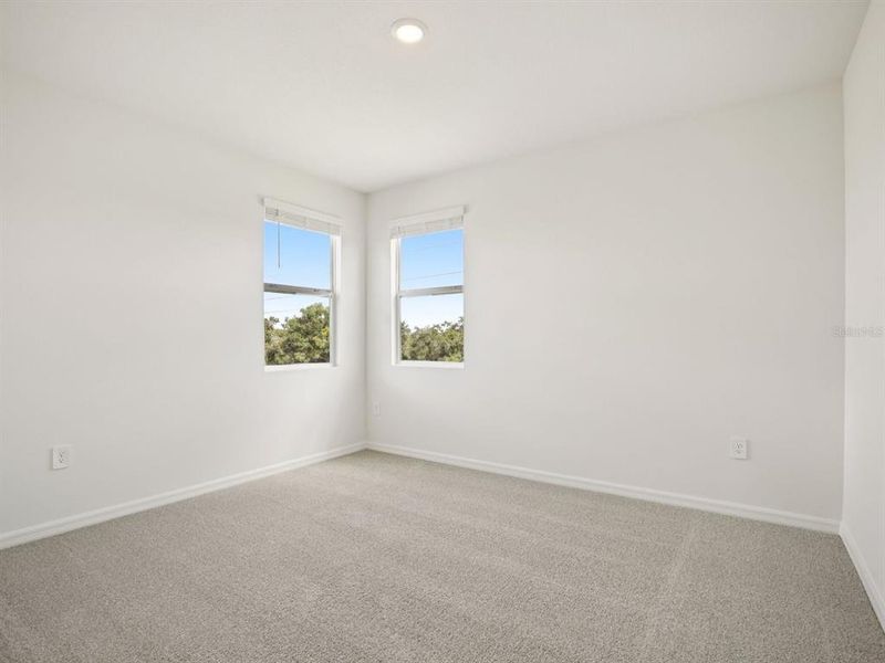 Spacious, unfurnished interior of a new home in Coasterra - Reserve Series, Palmetto (Image 36).