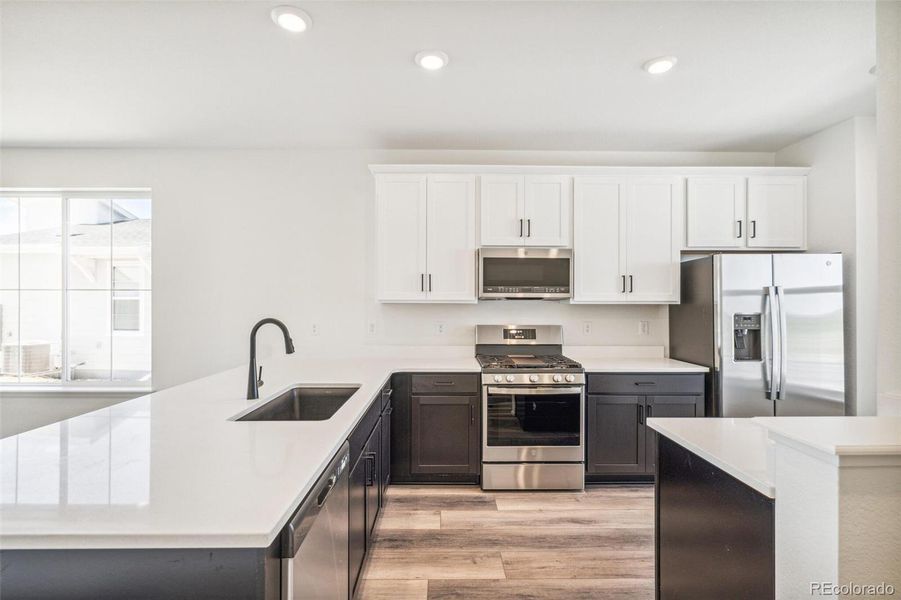 Furnished interior view inside a new home in Legato, Commerce City (Image 10).