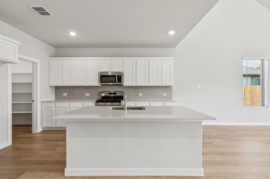 Kitchen in the Winters home plan by Trophy Signature Homes – REPRESENTATIVE PHOTO