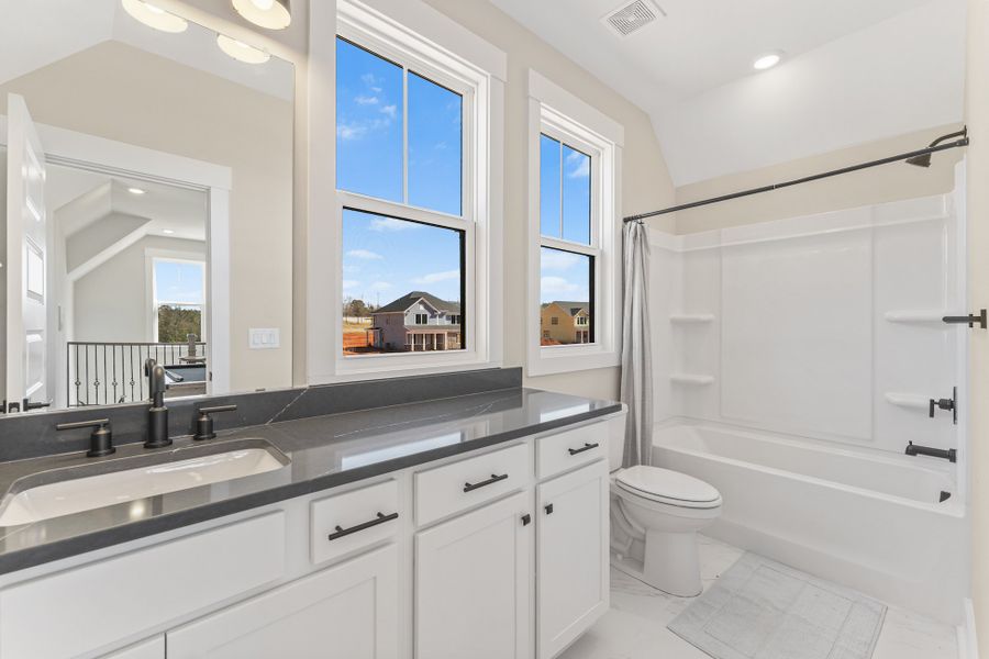 Representative furnished interior of a home built from the Emmy by Hunter Quinn Homes in Greenpond Acres, Woodruff (Image 17).
