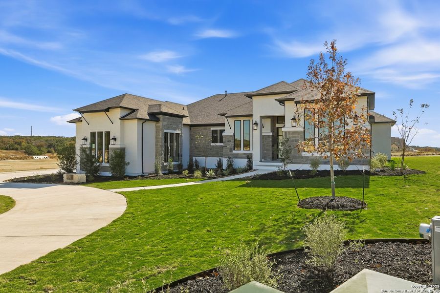 Front exterior of a new home in George's Ranch, Boerne, TX, highlighting curb appeal (Image 26). Front exterior of a new home in George's Ranch, Boerne, TX, highlighting curb appeal (Image 26).