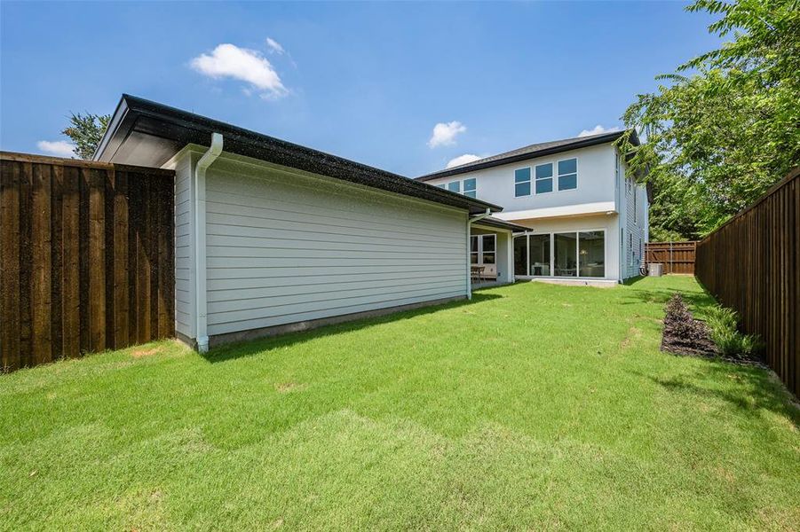 Front exterior of a new home in , Dallas, TX, highlighting curb appeal (Image 2).