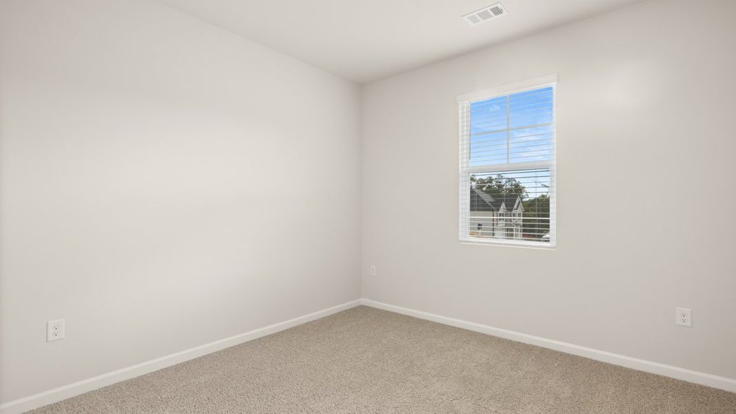 Representative unfurnished interior of a home built from the Avion by D.R. Horton in Brooks Station, Dacula (Image 16).