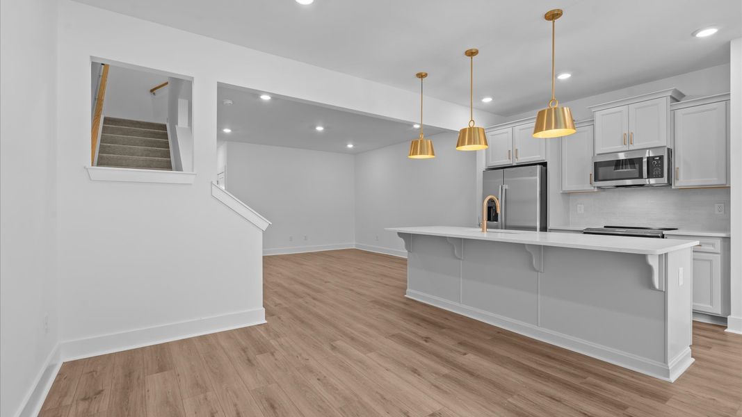 Tasteful dining area with current design in this vibrant two-story townhome near Downtown Simpsonville