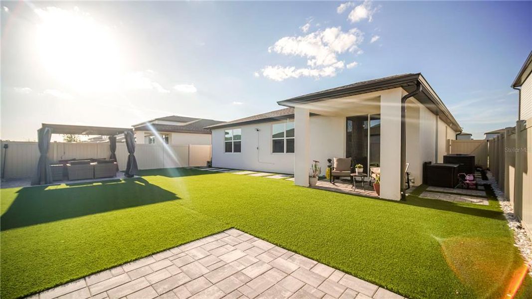 Exterior details and patio area of a home in , St. Cloud (Image 29).