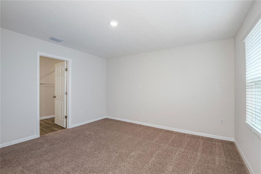 Spacious, unfurnished interior of a new home in Pasadena Woods, Dade City (Image 21).