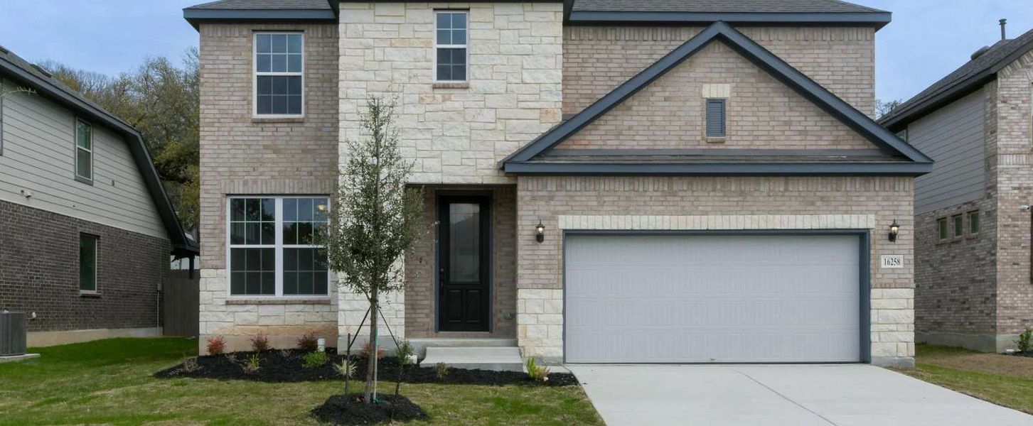 Representative exterior photo of a completed home built from the Cleburne by Ashton Woods in Mustang Oaks, San Antonio, TX (Image 26).