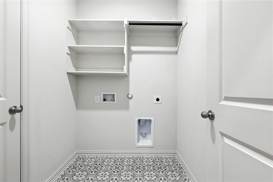 Laundry room featuring electric dryer hookup, washer hookup, tile patterned flooring, and gas dryer hookup