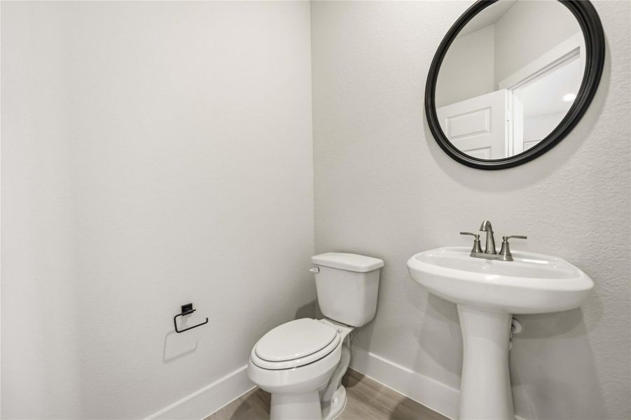 Furnished interior view inside a new home in Alicante, Houston (Image 9).