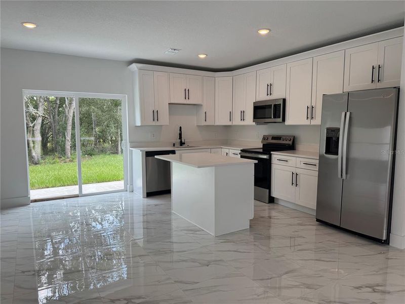 Furnished interior view inside a new home in , Citrus Springs (Image 4).