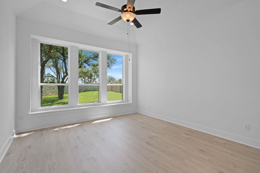 Primary Bedroom with elevated ceiling Primary Bedroom with elevated ceiling