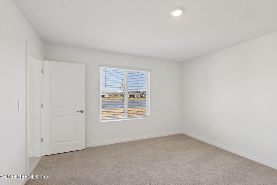 Spacious, unfurnished interior of a new home in Colbert Landings, Palm Coast (Image 18).