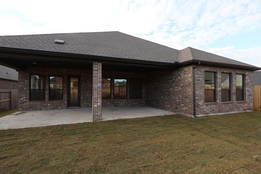 Exterior details and patio area of a home in Riceland 60’ Homesites, Mont Belvieu (Image 3). Exterior details and patio area of a home in Riceland 60’ Homesites, Mont Belvieu (Image 3).