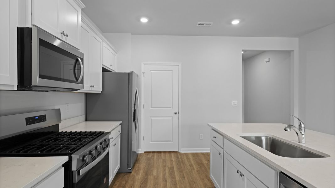 Representative furnished interior of a home built from the ARIA by D.R. Horton in Pineview North, Summerville (Image 9).