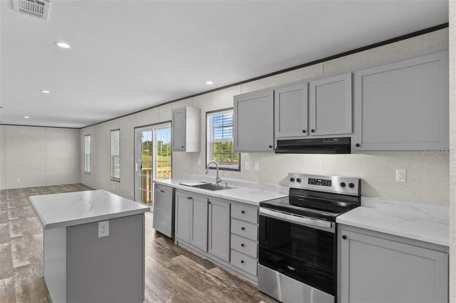 Furnished interior view inside a new home in , Fort McCoy (Image 5).