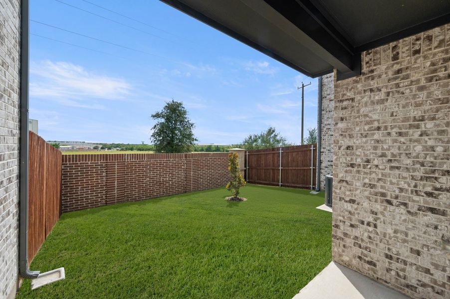 Front exterior of a new home in Main Street Village, Mansfield, TX, highlighting curb appeal (Image 26).