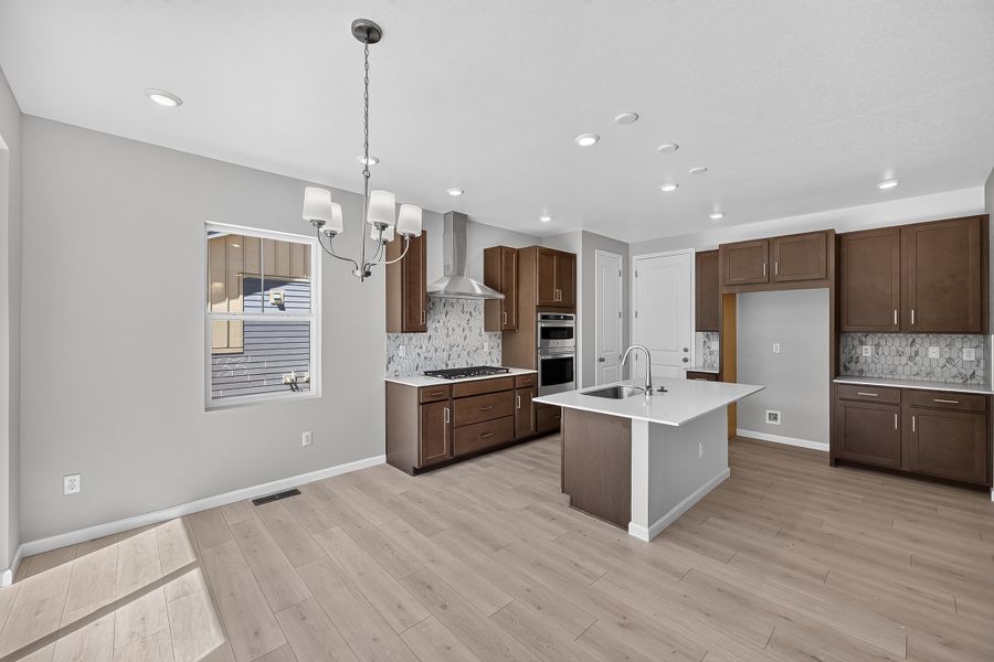 Furnished interior view inside a new home in Trailstone, Arvada (Image 13).