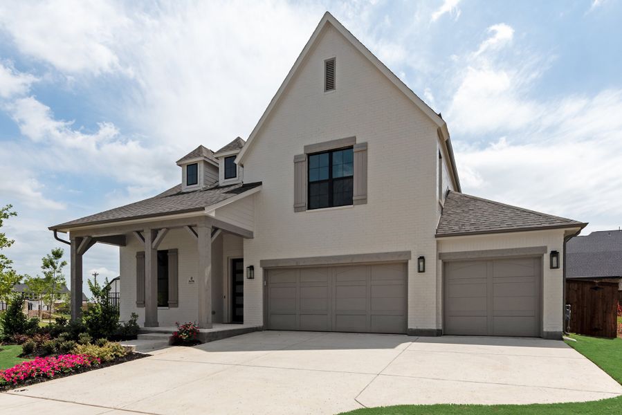 Front exterior of a new home in Estates at Rockhill, Oak Point, TX, highlighting curb appeal (Image 22).