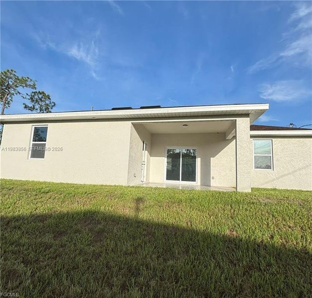Exterior details and patio area of a home in , Lehigh Acres (Image 3).