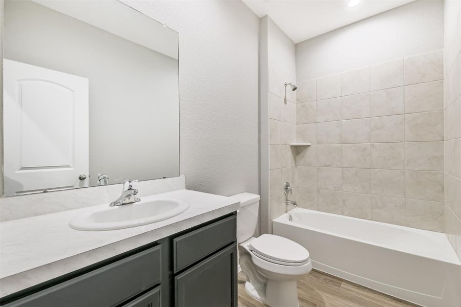 Furnished interior view inside a new home in Harrington Trails at The Canopies, New Caney (Image 13).