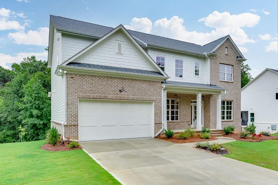 Front exterior of a new home in , Sugar Hill, GA, highlighting curb appeal (Image 25). Front exterior of a new home in , Sugar Hill, GA, highlighting curb appeal (Image 25).
