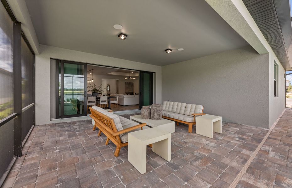 Exterior details and patio area of a home in The Strand at Cedar Grove, North Port (Image 2). Exterior details and patio area of a home in The Strand at Cedar Grove, North Port (Image 2).