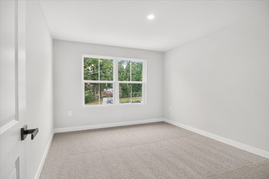 Spacious, unfurnished interior of a new home in Arden Woods, Greenville (Image 16).