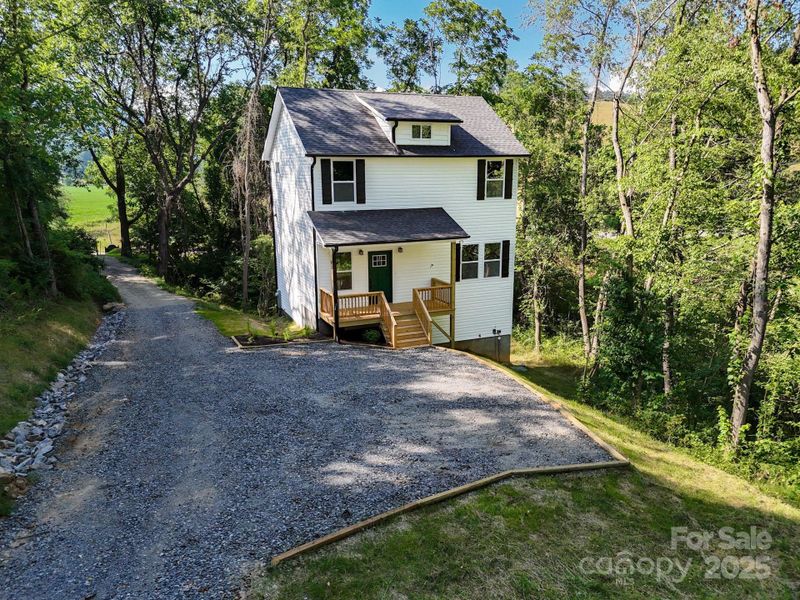 Front exterior of a new home in , Waynesville, NC, highlighting curb appeal (Image 20). Front exterior of a new home in , Waynesville, NC, highlighting curb appeal (Image 20).