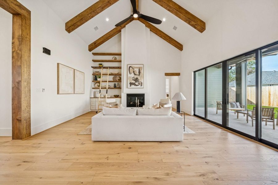The left side shows the foyer and the door on the back right leads to the primary bedroom.