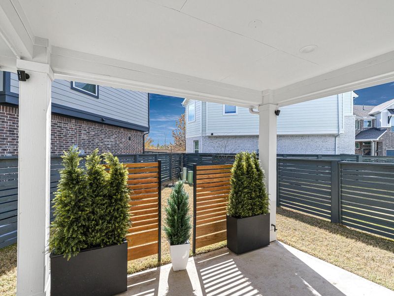 Exterior details and patio area of a home in Bridgeland, Cypress (Image 4). Exterior details and patio area of a home in Bridgeland, Cypress (Image 4).