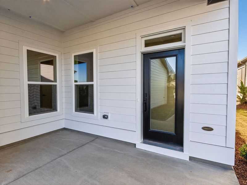 Exterior details and patio area of a home in Encore at Chatham Park – Villa Series, Pittsboro (Image 3). Exterior details and patio area of a home in Encore at Chatham Park – Villa Series, Pittsboro (Image 3).