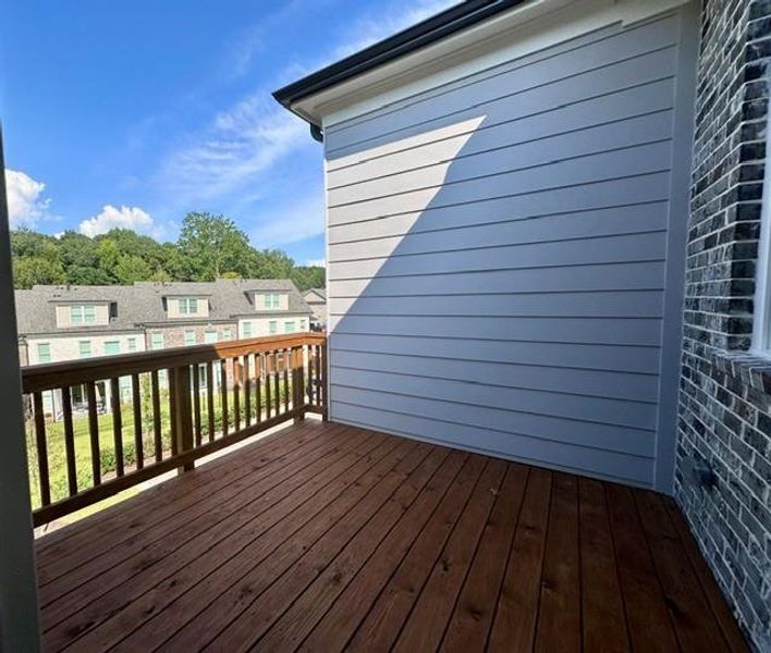 Exterior details and patio area of a home in Ward's Crossing Townhomes, Johns Creek (Image 3). Exterior details and patio area of a home in Ward's Crossing Townhomes, Johns Creek (Image 3).