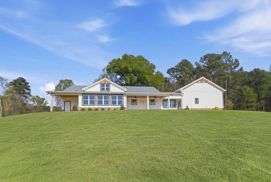 Exterior details and patio area of a home in , Senoia (Image 38).