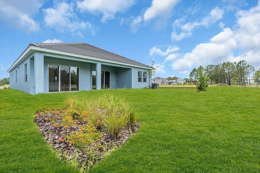 Exterior details and patio area of a home in Tamarack at Two Rivers, Zephyrhills (Image 2). Exterior details and patio area of a home in Tamarack at Two Rivers, Zephyrhills (Image 2).