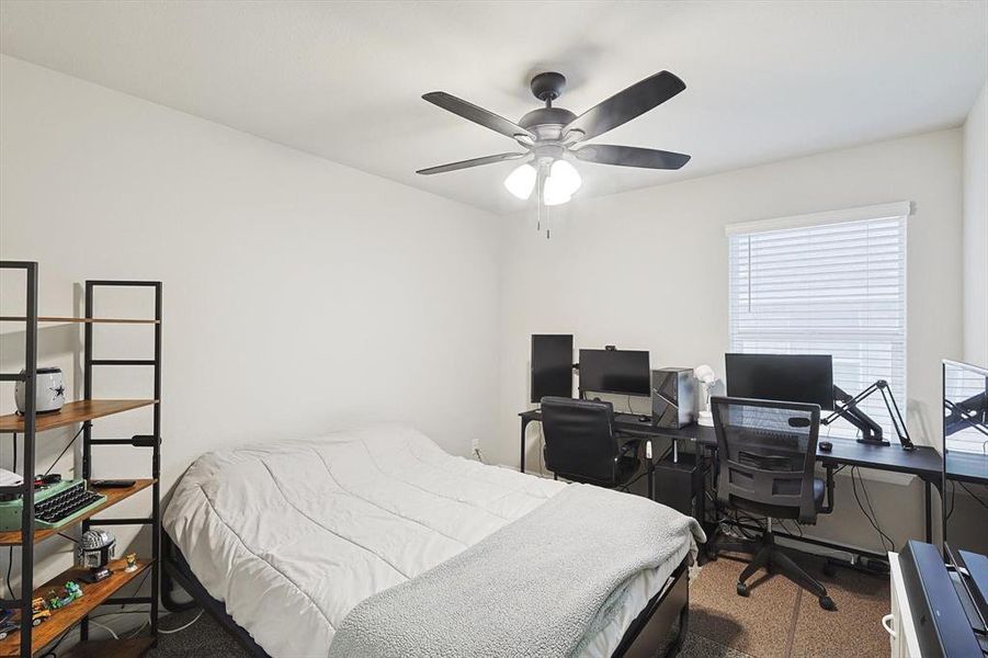 Bedroom with a ceiling fan