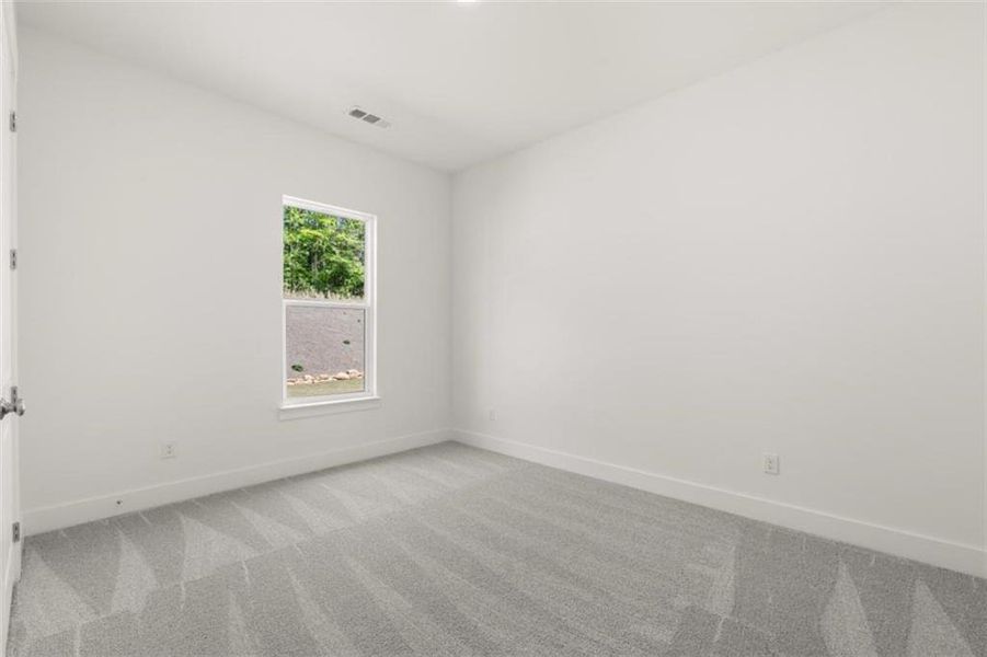 Spacious, unfurnished interior of a new home in Traditions of Braselton, Jefferson (Image 17).