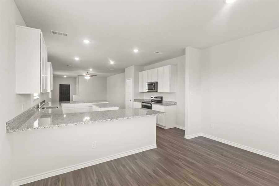 Furnished interior view inside a new home in Retreat at Fossil Creek, Fort Worth (Image 6).