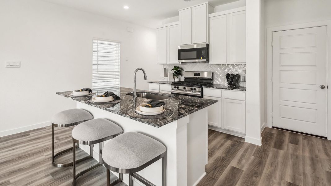 Representative furnished interior of a home built from the Hibiscus by D.R. Horton in Legacy Village, Houston (Image 7). Representative furnished interior of a home built from the Hibiscus by D.R. Horton in Legacy Village, Houston (Image 7).