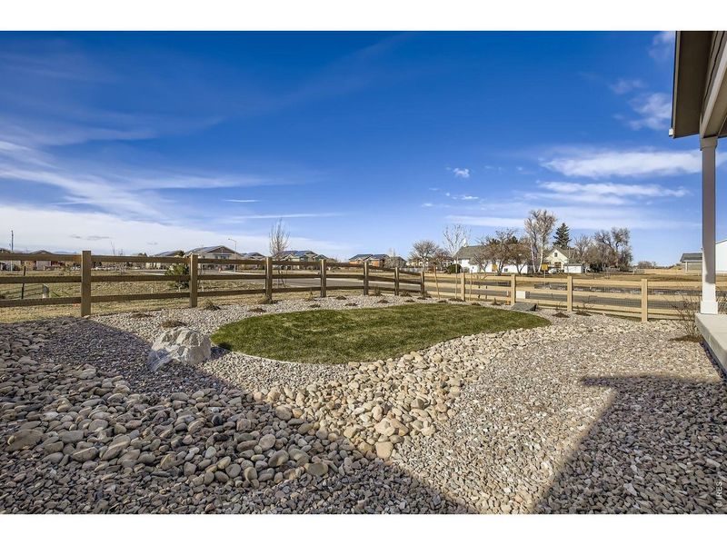 Exterior details and patio area of a home in Farmstead, Berthoud (Image 3).
