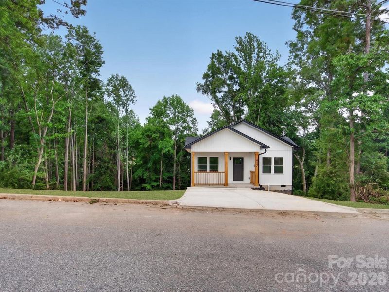 Front exterior of a new home in , Hickory, NC, highlighting curb appeal (Image 27).
