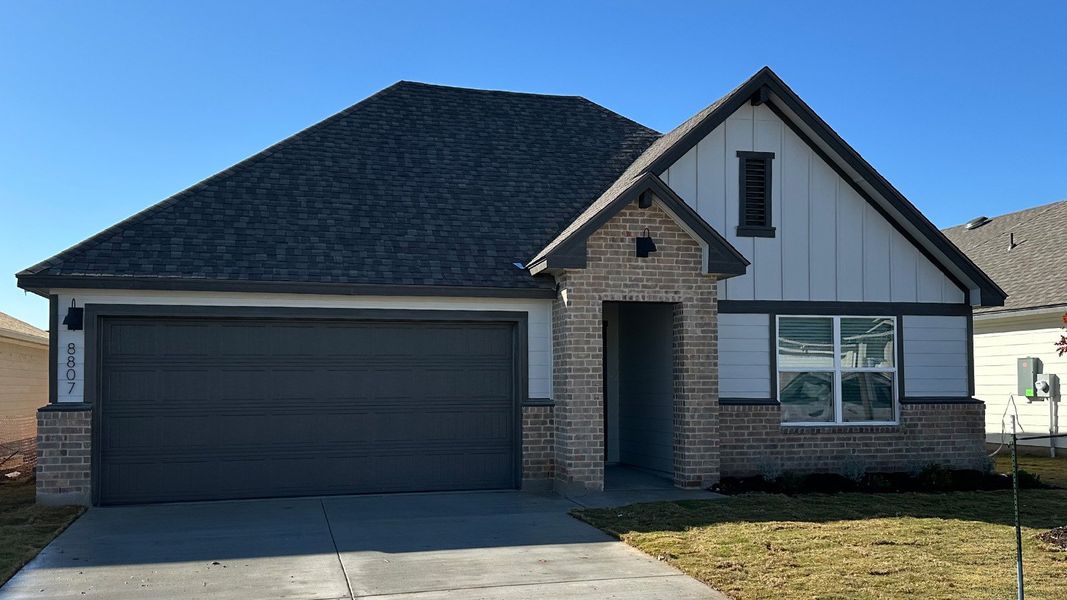 Front exterior of a new home in Mesa Ridge, Temple, TX, highlighting curb appeal (Image 21).