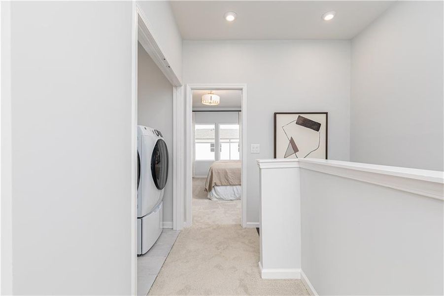 Furnished interior view inside a new home in The Beacon at Old Peachtree Townhomes, Lawrenceville (Image 13). Furnished interior view inside a new home in The Beacon at Old Peachtree Townhomes, Lawrenceville (Image 13).