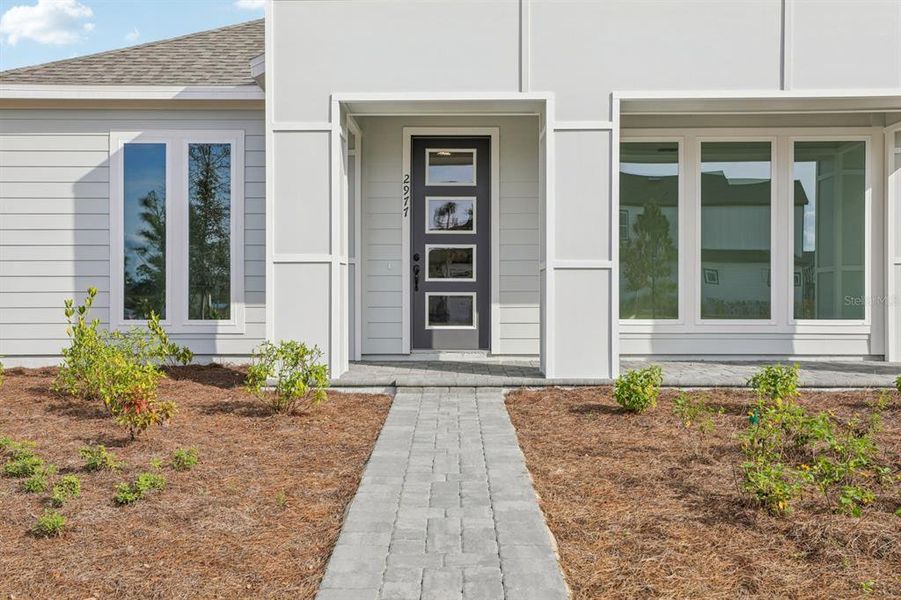 Exterior details and patio area of a home in Weslyn Park Single Family, St. Cloud (Image 3).