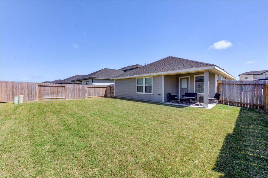 Exterior details and patio area of a home in , Fulshear (Image 25).