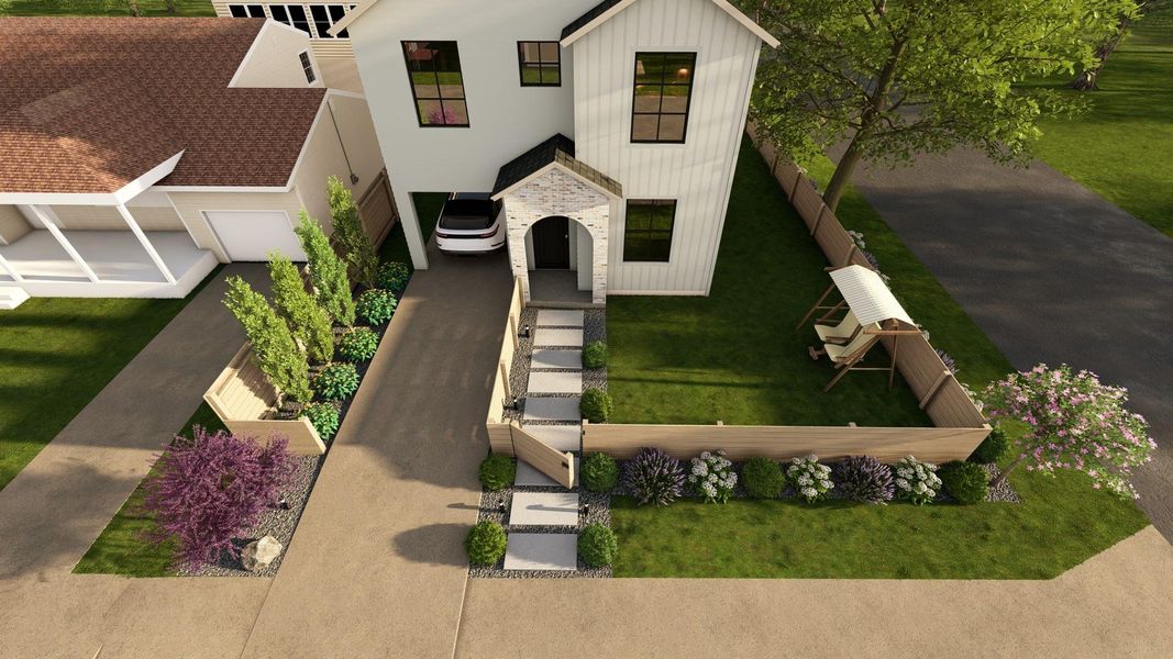 View of front of house with driveway, a front yard, and stucco siding
