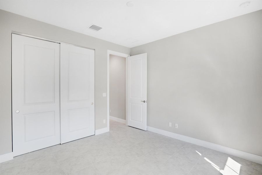 Spacious, unfurnished interior of a new home in Lake Park at Tradition, Port St. Lucie (Image 22).