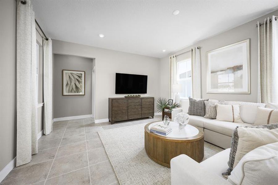 Representative furnished interior of a home built from the Hutchinson by Ryan Homes in Lake Mattie Preserve, Auburndale (Image 10).