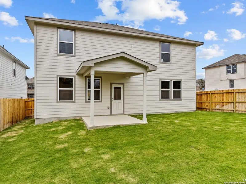 Exterior details and patio area of a home in Royal Crest, San Antonio (Image 3).