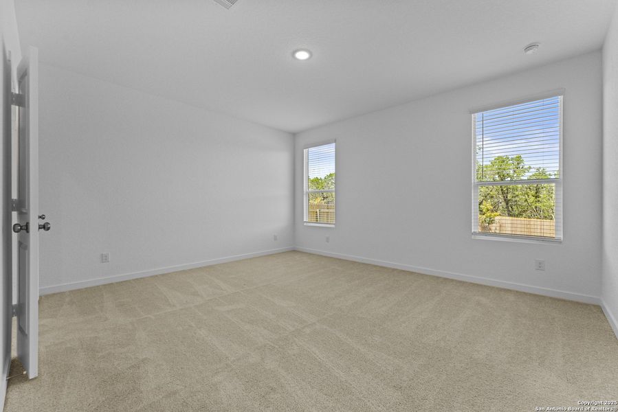 Spacious, unfurnished interior of a new home in Waterwheel: Coastline Collection, San Antonio (Image 18).